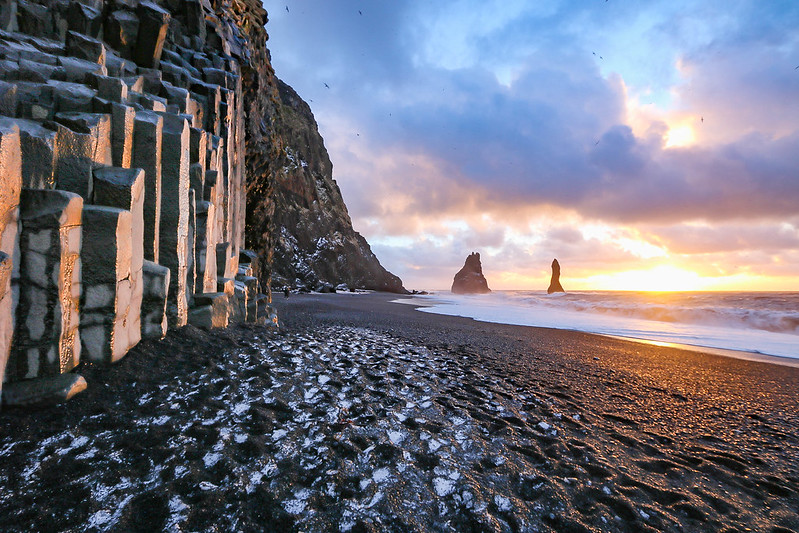Iceland South Coast tour featuring waterfalls, black-sand beaches, glaciers, and dramatic coastal cliffs.